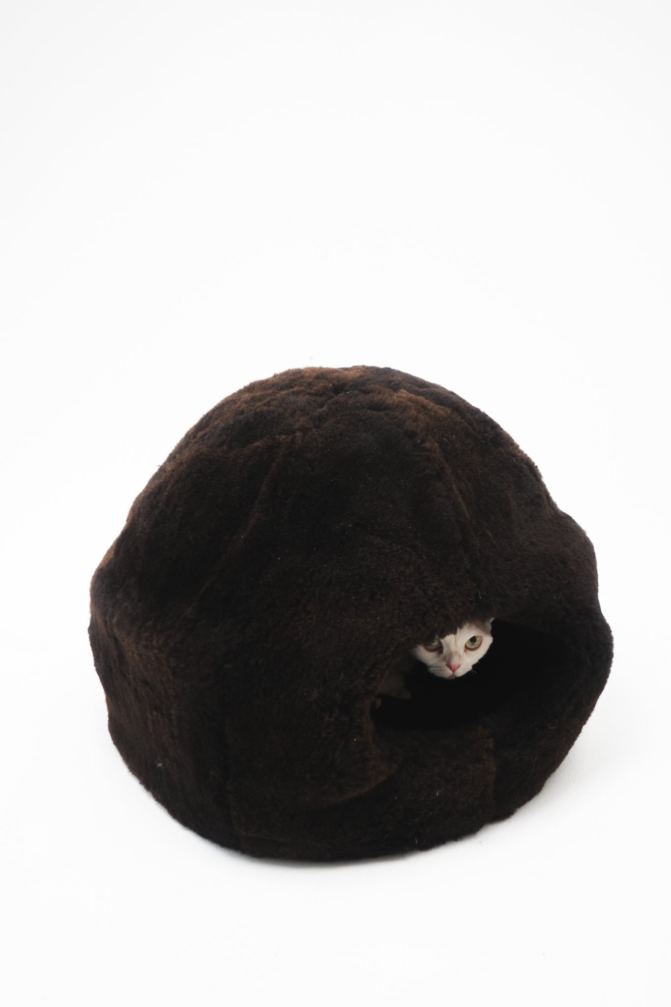 Dark brown plush cat cave on a white background | Natural, non‑toxic pet nest for cats and small dogs | Cozy, handmade pet furniture, natural wool and sheepskin


